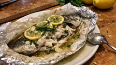 Branzino al Cartoccio: an easy parchment-baked sea bass with lemon and herbs